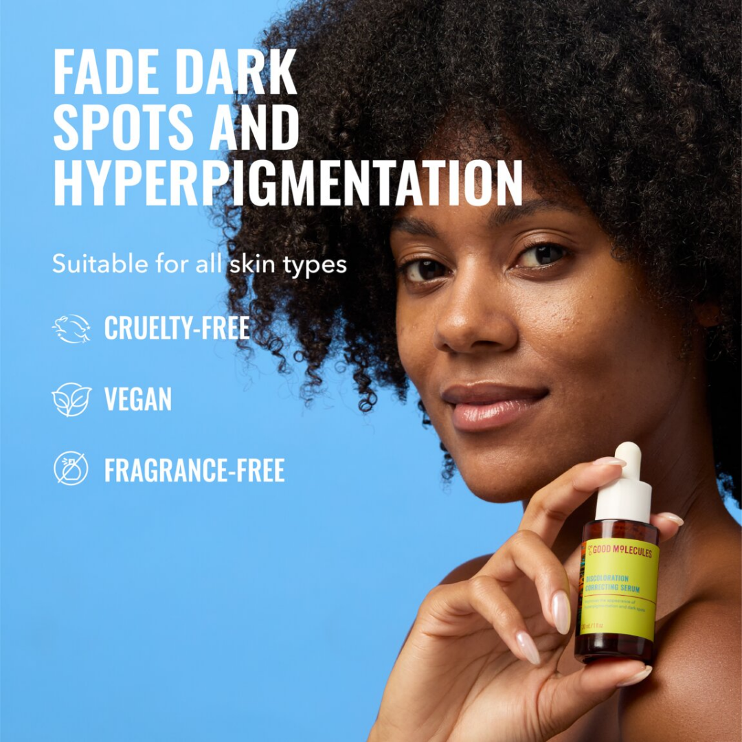 Woman holding a skincare product with text about fade dark spots and hyperpigmentation, suitable for all skin types.