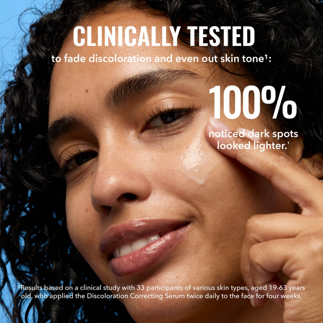 Person applying skincare product with text about clinical testing and skin tone improvement.